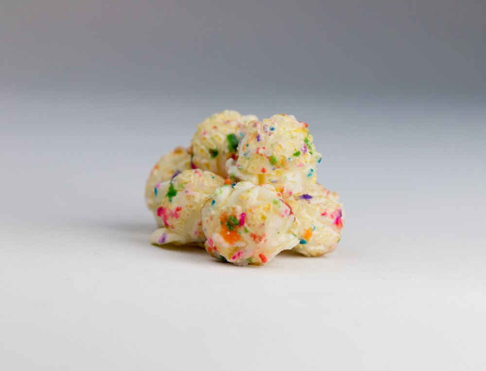 A Pop Above birthday cake popcorn with colorful sprinkles