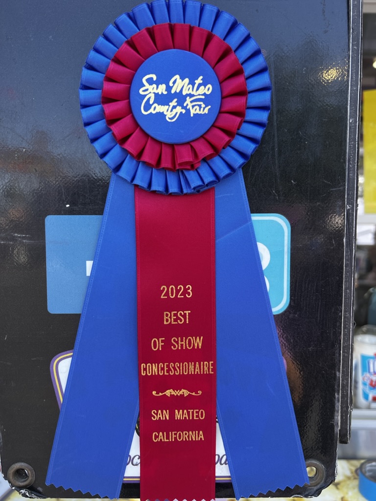A Pop Above’s 2023 San Mateo County Fair Best of Show Concessionaire ribbon
